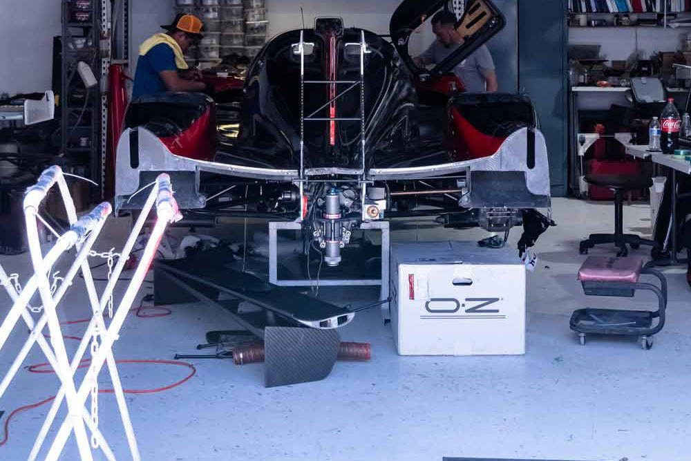 Prototype race car under work in the shop